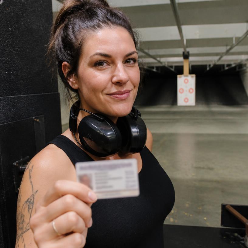 Marisa K. from Arizona holding their new concealed carry permit